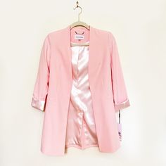 This Calvin Klein Pink Blazer Is The Perfect Piece To Top Over Any Outfit. It’s Complete With A Light Pink Silk Stripe Lining, Open Front, And Sleeves That Roll Up Or Down. Perfect To Wear This Spring Or Summer Season ‘21 For The Perfect Pop Of Pink. (New With Tags In Size 2p) Elegant Tailored Calvin Klein Blazer, Elegant Long Sleeve Calvin Klein Blazer, Chic Calvin Klein Formal Blazer, Calvin Klein Elegant Spring Blazer, Calvin Klein Spring Outerwear With Notch Lapel, Calvin Klein Spring Office Blazer, Spring Office Blazer By Calvin Klein, Classic Calvin Klein Blazer For Spring, Feminine Tailored Spring Blazer