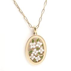 Vintage gold tone pendant necklace with white enamel flowers and cream enamel border. Spring ring closure. Very good pre-owned condition. Some general wear to the chain. Chain Length 25" Pendant Length 2" Width 1 1/4" All purchases come carefully packed in a reusable cloth gift bag!  Please Note  All items are vintage, meaning they have been previously owned and loved. Some wear should be expected. I try to describe every item fully and point out flaws or defects. Be sure to check the description and pictures carefully for important info such as size and condition. If you'd like more information or photos, don't hesitate to contact me before purchasing! I do not accept returns unless wrong item is sent or item is greatly misrepresented in the description. I am not responsible for loss or d Enamel Flower, Apple Blossom, Gold Tone Necklace, White Enamel, Spring Rings, Link Chain, Chain Length, Vintage Gold, Gift Bag