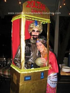 a man and woman dressed in costumes standing next to each other