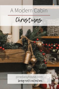 a wooden shelf with christmas decorations and candles on it, text reads a modern cabin christmas