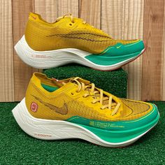 Nike Dj5182-700 Zoomx Vaporfly Next% 2 Dark Sulfur Green Women's Sz 6.5/ Mens Sz 4.5 Yellow Lace-up Running Shoes, Yellow Running Shoes With Air Cushioning, Yellow Running Shoes For Spring With Round Toe, Yellow Running Shoes With Round Toe For Spring, Sporty Yellow Marathon Running Shoes, Sporty Yellow Running Shoes For Marathon, Yellow Running Shoes For Spring, Yellow Low-top Running Shoes With Boost Midsole, Yellow Running Shoes With Air Cushioning For Sports