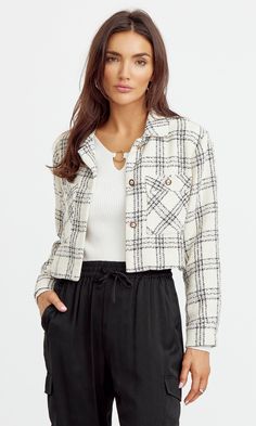 Cropped, tweed jacket with plaid print. This collared coat features a button-front closure and front pockets accented with gold buttons. Matches over casual or formal attire. Tweed jacket Cropped Button front Pockets Lined Length: 18" Chest: 19 1/4" Self: 100% Polyester Lining: 100% Rayon Hand wash in cold water with similar colors. Model is wearing a size small Style #: G2312J1719 Single-breasted Tweed Button-up Outerwear, Fall Button-up Tweed Jacket With Buttoned Pockets, Chic Fall Tweed Jacket With Buttoned Pockets, Fall Tweed Jacket With Buttoned Pockets For Work, Chic Button-up Tweed Jacket With Pockets, Tweed Outerwear With Buttoned Pockets For Fall, Fall Tweed Outerwear With Buttoned Pockets, Winter Tweed Blazer With Buttoned Pockets, Plaid Tweed Blazer With Pockets