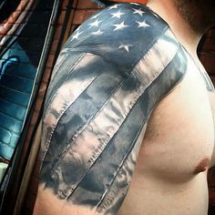 a man with an american flag tattoo on his arm