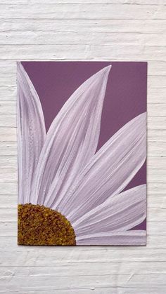 a painting of a white flower on a purple background