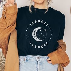 Casual Long Sleeve Star Print T-shirt, Black Long Sleeve Top With Moon Print, Black Moon Print Crew Neck Top, Black Crew Neck Top With Moon Print, Trendy Crew Neck T-shirt With Moon Print, Trendy Moon Print Crew Neck Top, Trendy Crew Neck Top With Moon Print, Long Sleeve Cotton Tops With Moon Print, Long Sleeve Cotton Top With Moon Print