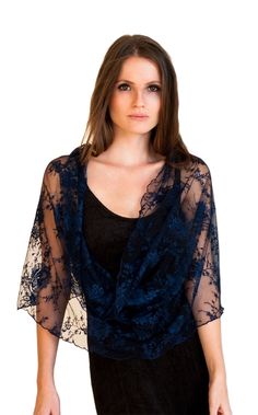 Step into a world of captivating elegance with our Navy Blue Lace Loop Shawl - a mesmerizing and lightweight accessory that effortlessly enhances your look in four different ways: as a shrug, shawl, crisscrossed shawl, or scarf. The deep navy blue hue combined with intricate lace exudes sophistication and charm, making it a perfect choice for special occasions and events. Available in three sizes for a flawless fit: Petite (US 0-6) One size (US 8-14) Plus size (US 14-22) This exquisite lace shawl comes with wearing instructions, beautifully presented in a printed gift bag, making it a thoughtful and charming gift option for your loved ones. Additionally, we've thoughtfully included a QR code linked to the movie clip, granting you easy access to styling ideas. Experience the elegance in our Shrugs For Dresses, Bolero Top, Lace Shrug, Bridesmaid Shawl, Wedding Shrug, Shrug For Dresses, Shrugs And Boleros, Wrap Gift, Bridal Shawl