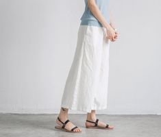 Name: Pure Color Linen Trousers White Women Slacks Pants Fabric: Fabric has no stretchSeason: Spring,Summer,Fall Pant Type: Loose pants Waist Type: High WaistLength: LongColor: Black,WhiteStyle: CasualMaterial: 100%Linen Model Size: Small Size Height/Weight:168 cm/47 kg*SIZE S (US 4-6, UK 8-10, EU 34-36)bust: fits bust around 86.4-88.9 cmwaist: fits waist around 66-68.6 cmhips: fits hips around 92.7-95.3 cm*SIZE M (US 8-10, UK 12-14, EU 38-40)bust: fits bust around 91.4-94 cmwaist: fits waist ar Women Slacks, White Solid Color, White Linen Trousers, Slacks Pants, Trousers White, Slacks For Women, Long Sleeve Outfits, Wide Leg Crop Pants, Fall Pants