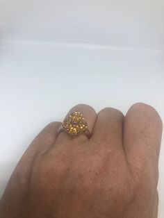 Unusual small citrine pave 925 Sterling silver Filigree Setting Handmade Size 5.75 Can be resized, my jeweler charges a $10-$20 fee All rings are shipped in a nice gift box. Check out our over a THOUSAND great reviews!!! Engraving is $4 per letter and is not always perfect depending on the piece. It can take a few days if the jeweler is busy. This is payable to Paypal Judithsltd@gmail.com Orange Topaz Ring With Accent Stones, Orange Topaz Ring With Accent Stones As Gift, Orange Topaz Ring With Accent Stones For Gift, Fine Jewelry Cluster Gift, Orange Rings With Accent Stones For Gift, Topaz Ring Jewelry Gift, Yellow Gold Topaz Ring In Sterling Silver Gift, Topaz Ring Jewelry As A Gift, Sterling Silver Yellow Gold Topaz Ring Gift