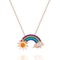 Trendsetting 925 Silver Rainbow Necklace Is A Fun Carefree Addition To Your Jewelry Collection. This Stylish Rainbow Necklace Is Made Of 925 Sterling Silver. Necklace And All Components Are 18k Rose Gold Plated Sterling Silver. Our Necklace Is Then Coated In Rhodium Which Helps To Retain Brightness Of The Necklace And Delays Oxidation. The Stones On The Shooting Star Pendant Are Zircon. The Chain Length Is 16" Long Plus A 2" Extension. Rainbow Sterling Silver Round Jewelry, Rainbow Sterling Silver Jewelry As Gift, Rainbow Sterling Silver Jewelry Gift, Rainbow Round Sterling Silver Jewelry, Rainbow Colored Sterling Silver Jewelry Gift, Rainbow Colored Round Sterling Silver Jewelry, Multicolor Sterling Silver Necklace With Adjustable Chain, Rainbow Sterling Silver Jewelry For Anniversary, Rainbow Stuff