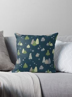 a blue and green christmas pattern with trees on it throw pillow by designbyte