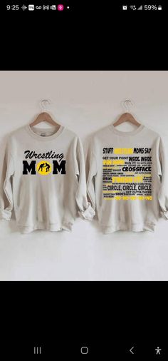 two sweatshirts hanging on a wall with the words wedding mom and dad printed on them