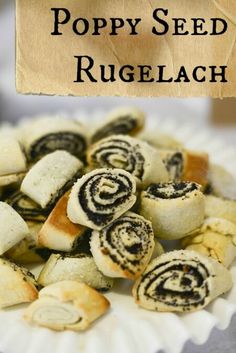 there is a paper plate that has some food on it with the words poppy seed rugelach