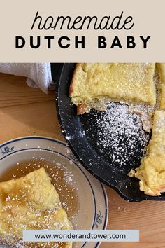 homemade dutch baby bread with powdered sugar on top and in a cast iron skillet