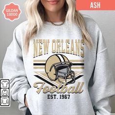 Show off your love and support for Football in this unisex crewneck sweatshirt 🏈. This trendy, vintage style sweatshirt is pure comfort and is sure to become your new favorite or the perfect gift for the football fans in your life! ✨ FIT & STYLE ✨ This soft, cozy sweatshirt is a medium-heavy fabric. Runs true to size so size up for a looser, oversized look. The collar is ribbed knit, so it retains its shape even after washing and there are no itchy side seams on these sweatshirts. .: 50% cotton Vintage Letter Print Sweatshirt For Fan Gear, Vintage Letter Print Sweatshirt For Game Day, Vintage Pre-shrunk Sweatshirt For Fans, Vintage Pre-shrunk Sweatshirt For Fan Merchandise, Pre-shrunk Vintage Sweatshirt For Fans, Retro Sweatshirt For Fall Sports Events, Retro Sweatshirt For Sports Events In Fall, Retro Long Sleeve Pre-shrunk Sweatshirt, Vintage Crew Neck Sweatshirt With Lettering