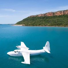 an airplane that is floating in the water