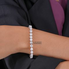 Lab Grown Diamond Bracelet, Round Diamond Four Prong Set Bracelet in 14KWhite Gold, Diamond Tennis Bracelet *Stone: Lab Grown Diamond *Metal:  14k Solid Gold *Net Gold - 14.49 *       No. Of Diamond - 42 *       Diamond Size - 3.70MM *       Bracelet Length - 6.5 Inches *Carat - 7.65 *Diamond color: White *      Silver weight: 14.49 *      Diamond Weight: 7.65 *Handmade item Metal Finishing Available: 14k Solid Yellow Gold, 14k Sold Rose Gold and 14K Solid White Gold    *Gift wrapping available Elegant Round Heart Bracelet With Cubic Zirconia, Elegant Round Cubic Zirconia Heart Bracelet, Elegant Cubic Zirconia Heart Bracelet, Classic Diamond Heart Bracelet In White Gold, Classic White Gold Diamond Heart Bracelet, Formal White Gold Heart Bracelet With Cubic Zirconia, Formal White Gold Heart Bracelet With Diamond Accents, Luxury Diamond Heart Bracelet For Formal Occasions, Luxury Diamond Heart Bracelet For Formal Events