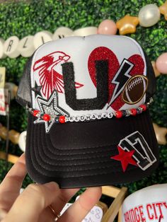 This has a custom vinyl mascot. If you'd like your mascot, message it to me!  Friday Night Lights hair? Don't care!  Every football mom needs one of our custom trucker hats to wear on Friday nights. I also have different colored footballs, baseballs, soccer balls, hockey sticks, volleyballs and basketballs!   All our hats are totally customizable, so message us to request custom colors or patches. We can build a custom listing just for you! High School Spirit, Homecoming Spirit, Football Spirit, Custom Trucker Hats, Friday Nights, Hockey Sticks, Crafty Mama, Friday Night Lights, Soccer Balls