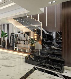 an elegant staircase with black and white marble