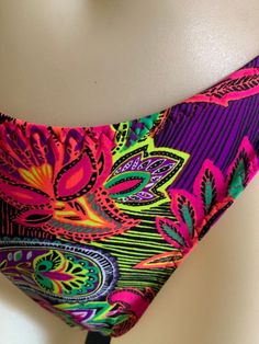 "70's and 80s style string bikini with high leg! Mannequin is a size small and A/B cup for reference. Bra top is lined but not padded for comfort. Bottoms are lined and can be made as a thong, tanga or full coverage (shown). Sizing- PLEASE DOUBLE CHECK YOUR SIZE BELOW BEFORE PLACING AN ORDER. If you send me your measurements (waist, hip and cup size) that would ensure a proper fit. If you need different sizes for the top and bottom, just leave a note in your order. XX small Bust 28 \"- 30 \" A/B Colorful Stretch Swimwear For Swimming, Vibrant Triangle Top Swimwear For Festivals, Vibrant Stretch Swimwear With Triangle Top, Vibrant Party Swimwear For Beach Season, Multicolor Party Swimwear With Tie-side Bottom, Stretch Multicolor Lined Swimwear, Colorful Swimwear For Beach Season Party, Colorful Beachwear Swimwear For Party, Colorful Party Beachwear Swimwear