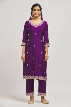 Purple pure spun silk kurta with thread and marori hand embroidery. Comes with pant and a pure organza dupatta.
Components: 3
Pattern: Hand embroidered
Type Of Work: Thread, Marori
Neckline: Scalloped Neck
Sleeve Type: Three quarter
Fabric: Pure spun silk, Dupatta: Pure organza
Color: Purple
Other Details: 
Side slits on kurta
Embroidered borders on dupatta
Occasion: Mehendi and Haldi - Aza Fashions Kurta Pant Set, Silk Kurta, Organza Dupatta, Kurta With Pants, Silk Dupatta, Silk Thread, Pant Set, Aza Fashion, Sleeve Type