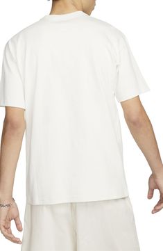 With dropped shoulders and a loose fit, this cotton T-shirt boasts a carefree, comfortable appeal. Front-and-center logo embroidery finishes off this look with a swoosh. Crewneck Short sleeves 100% cotton Machine wash, line dry Imported Center Logo, Logo Embroidery, Embroidery Logo, Cotton T Shirt, Cotton Tshirt, Loose Fitting, Short Sleeves, Nordstrom, Nike