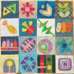 a patchwork quilt with many different designs on it