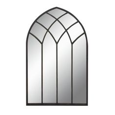 an arched window with a glass pane on the top and bottom, is shown