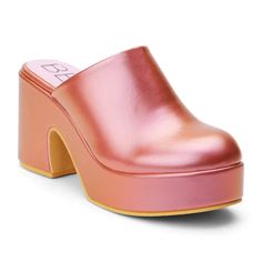 Clog-inspired vegan platform mule. Synthetic leather upper Manmade outsole 3.5 in / 8.89 cm heel 1.5 in / 3.81 cm platform Synthetic leather lining Padded insole Slip-on style Whole sizes only; for 1/2 sizes, order next size up. Pink Platform Slip-on Slippers, Pink Mules With Platform Block Heel, Pink Platform Mules With Block Heel, Pink Block Heel Platform Mules, Pink Block Heel Mules With Platform, Pink Platform Clogs In Synthetic Material, Pink Platform Synthetic Clogs, Pink Platform Mules In Synthetic Material, Pink Platform Mules With Synthetic Material