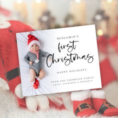 a christmas card with a baby wearing a santa hat