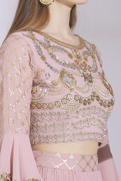 Onion pink lehenga with placement sequin work. Comes with bell sleeve embroidered blouse and scallop border dupatta.
Components: 3
Fabric: Georgette
Neckline: Round
Sleeve Length: Three Quarter
Color: Pink
Embroidered
Layered bell sleeves
Scallop border dupatta
Gathered detail
Closure: Blouse: Back zip - Aza Fashions Traditional Fitted Hand Embellished Sharara, Hand Embellished Fitted Sets For Eid, Fitted Hand Embellished Sharara For Festivals, Transitional Hand Embellished Lehenga, Hand Embellished Fitted Anarkali Set For Diwali, Fitted Hand Embellished Lehenga For Diwali, Diwali Hand Embellished Fitted Anarkali Set, Fitted Hand Embellished Traditional Wear For Diwali, Traditional Fitted Hand Embellished Sets