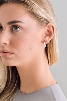 The bolder, the better with this beloved classic! Handcrafted in 14k solid gold, these are our lightest hoops ever. Raw, loose, and bold so you can wear them all day, every day - it’s a year-long style. Small Hoops: 20mm Medium Hoops: 30mm Large Hoops: 40mm 14K yellow or white gold. Make to order. Lead time is 2 weeks. Benefits of Solid 14k Gold Jewelry Most loved for its durability and longevity Can be worn daily and requires less maintenance and care than plated, vermeil, or silver jewelry Swe Classic 14k Gold Hoop Earrings For Everyday, Classic Everyday Jewelry With Timeless Design, Timeless Yellow Gold Hoop Earrings For Everyday, Modern Polished Hoop Earrings For Everyday, Classic Hoop Huggie Earrings For Everyday, Everyday White Gold Huggie Jewelry, Modern Yellow Gold Huggie Earrings For Everyday, Timeless Tarnish-resistant Huggie Earrings For Everyday, Everyday 14k Gold Hoop Earrings