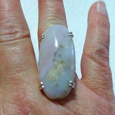 This Is A Beautiful, Handmade, Cocktail Sized, Pink Opal Ring In A Size 8. I Love It! It Is A Delicate Soft Colored Pink. The Dendrite Color Inclusions Are Almost 3d Because Of The Translucency Of The Stone. I Hope You Like It Too. The Silver Setting Makes This Ring Really Stand Out. Thanks For Stopping By And Feel Free To Leave Me A Fair Offer. :) Hp79887 Healing Moonstone Ring With Natural Stones, Pink Opal Rings As A Gift, Elegant Opal Ring With Natural Stones, Healing Rings With Natural Stones, Silver Pink Opal Ring Gift, Silver Pink Opal Ring For Gift, Elegant Silver Rings With Pink Opal, Oval Silver Opal Ring With Detailed Stones, Opal Ring With Large Stone As A Gift