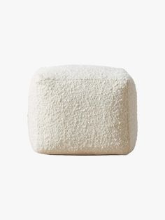 a white foam block on a white background