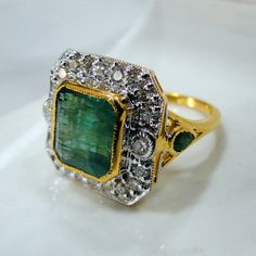 Emerald Ring, vintage 18K solid gold hallmarked Natural Emerald Diamond gemstone ring. Beautiful collection piece in very good condition. USA ring size -7.5 ( we can adjust size), size of top-18/18 mm, 18 K gold weight-8 grams, emerald weight-5.19 carat, diamond weight- 0.94 carat VS G. Will supply with a certificate. Emerald Ring Vintage Antique, Diamond Emerald Ring, Ring Rectangle, Smaragd Ring, Emerald Ring Vintage, Gold Bead Bracelets, Sapphire Gemstone, Natural Emerald, Emerald Diamond