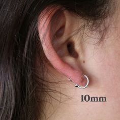 1 Pair Ball Hoop Earring Sterling Silver Hoop Post Earrings NO RETURNS ON EARRINGS - for sanitation reasons ✦ Quantity: 2 pieces (1 pair) Includes backings ✦ Material: sterling silver ✦ Dimensions: 19mm (1.3mm thick) or 10mm (1mm thick) ✦ Surface: shiny silver ** Please note that not all charms will slide onto these hoops. You may need jump rings to attach the charm to the hoops. If you have any questions about if a charm can slide, please send a message and I'll let you know! Jump rings: https: Adjustable Hypoallergenic Hoop Wrap Earrings, Adjustable Small Hoop Ear Wire Piercings, Nickel-free Minimalist Hoop Plug Earrings, Minimalist Hypoallergenic Hoop Plug Earrings, Adjustable Hypoallergenic Hoop Piercings, Adjustable Hoop Single Earring Piercing, Adjustable Hoop Single Earring, Hypoallergenic Adjustable Small Hoop Wrap Earrings, Earrings Silver Hoops