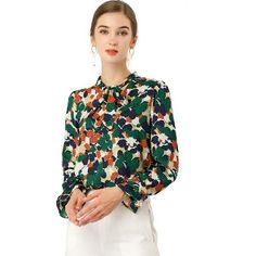 This floral top has a retro floral print for an easy-to-style look, and the soft chiffon fabric lends a comfortable, soft feel. Style it with your favorite jeans or skirts for a casual and chic look. Whether you're in the office or out on the town, this floral print blouse is perfect for any occasion. You will look fierce yet feminine in this lightweight woven blouse with a burgundy, black, and yellow floral print. The model is wearing an X-Small. Elegant Green Floral Print Blouse, Retro Patterned Blouse For Spring, Retro Patterned Spring Blouse, Retro Floral Print Blouse For Fall, Trendy Floral Print Office Blouse, Trendy Floral Print Top For Office, Trendy Floral Print Office Tops, Trendy Office Tops With Floral Print, Multicolor Floral Print Blouse For Work