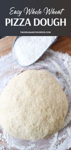 an easy whole wheat pizza dough recipe on a wooden table with flour in the background