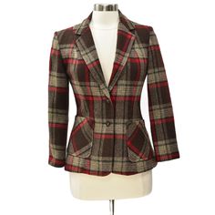 This vintage blazer is a must-have for any preppy or retro fashion enthusiast. With a bold plaid pattern in red and brown, this blazer is made from a comfortable wool blend material that is perfect for any season. The blazer has a chest of 34 inches and a length of 23 inches. This original piece from the 1970s is perfect for anyone looking to add a pop of color and style to their wardrobe. The blazer is in great shape and has been well-maintained over the years, making it a great investment for collectors. Don't miss out on this unique and stylish addition to your vintage clothing collection! Vintage Blazer, Womens Blazers, Plaid Pattern, Blazer Suit, Wool Blend, Retro Fashion, Color Pop, Vintage Outfits, Plaid