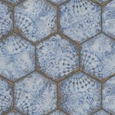 an abstract blue and brown pattern with hexagonal tiles