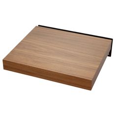 a large wooden cutting board with black trim