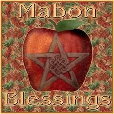 an apple with a pentagramil on it and the words, mabon blessings