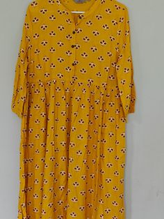 Product Description: Sizes in variations. Color Mud Red, Yellow , Blue, Green, Multi, Maroon and Black. Fabric: Cotton, Rayon. Style: Straight, Anarkali Yellow Floral Print Dresses For Diwali, Yellow Printed Kurta For Spring, Yellow Printed Cotton Kurta, Festive Yellow Tops With Printed Motifs, Spring Yellow Tops With Printed Motifs, Festive Yellow Blouse With Printed Motifs, Summer Yellow Kurta With Block Print, Casual Yellow Kurta With Printed Motifs, Spring Fitted Kurta With Kalamkari Print