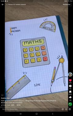 a notebook with maths written on it and some pencils next to the calculator