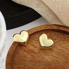 Solid 18k gold-plated heart stud earrings. 0.74" W x 0.66" H 18k gold-plated copper Heart Stud Earrings, Heart Studs, Heart Earrings Studs, 18k Gold, Plating, Copper, Stud Earrings, Gold, Bonito