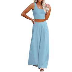 Elevate your fashion game with our Crop Top Long Sleeve Palazzo Pants Set. This stylish ensemble combines comfort and chic, making it a versatile addition to your wardrobe. Whether you're dressing up for a special occasion or looking for a stylish yet comfortable outfit for a casual day out, this set has you covered. The long sleeves provide added versatility, making it suitable for different seasons and settings. Specification: Unshrinkable, wrinkle-resistant fabric, always maintains its shape Spring Blue Sets With Solid Color, Blue Trousers Sets For Summer, Chic Blue Wide Leg Pants For Loungewear, Blue Solid Color Sets For Spring, Summer Loungewear Solid Color Wide Leg Pants, Solid Color Wide Leg Pants For Summer Loungewear, Wide Leg Summer Loungewear Pants, Chic Summer Sets With Ankle-length Pants, Chic Solid Color Sets For Day Out