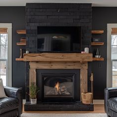 Please do not purchase a Mantel or shelves without first filling out the Quote Form and receiving a quote from us. Quote Form: https://form.jotform.com/240524957086059 Transform your fireplace into a focal point of rustic elegance with our Reclaimed Wood Beam Fireplace Mantels with Matching Shelves collection. Crafted from exquisite reclaimed pine wood beams, each mantel radiates timeless charm and character, while the accompanying shelves offer both aesthetic appeal and practical functionality. Black Chalk Paint Fireplace, Black Wall With Fireplace, Fireplace With Tile Hearth, Black Brick Fireplace Painted, Rustic Living Room Wall Decor Ideas, Urbane Bronze Fireplace, Black Walls Interior, Black Rock Fireplace, Interior Fireplace Ideas