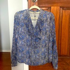 Brand Tommy Hilfiger Size Medium Colors Blue White And Gray Condition - New Without Tag, Never Worn. No Signs Of Wear And Tear Ruffles In The Front As Seen In The Video Where I’m Shaking The Top Casual Blue Paisley Print Tops, Casual Long Sleeve Paisley Print Blouse, Casual Long Sleeve Blouse With Paisley Print, Long Sleeve Tops With Paisley Print For Work, Blue Paisley Print Top For Fall, Tommy Hilfiger Long Sleeve Blouse For Spring, Tommy Hilfiger Long Sleeve Blouse, Blue Paisley Print Casual Blouse, Paisley Print Patterned Tops For Work