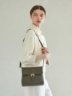 MONSAC caters to a wide range of customers from those in their early 50s to those in their 60s, and pursues comfortable and beautiful designs by incorporating practical aspects into the design. We aim to express a relaxed sensibility with EUROPEAN BASIC as the main concept.- Classic mood shoulder and cross bag- Minimal design yet generous size- Wide cross strap for a comfortable fit- Open and closing with hidden magnetic closure Classic Mood, Cross Bag, Leather Cross, Medium Bags, Cross Straps, Minimal Design, Magnetic Closure, Beautiful Design, Comfort Fit