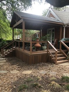 a wooden porch with steps leading up to it