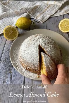 a lemon almond cake on a white plate